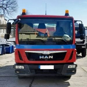 foto very good 12t MAN hook EUR6 withj container
